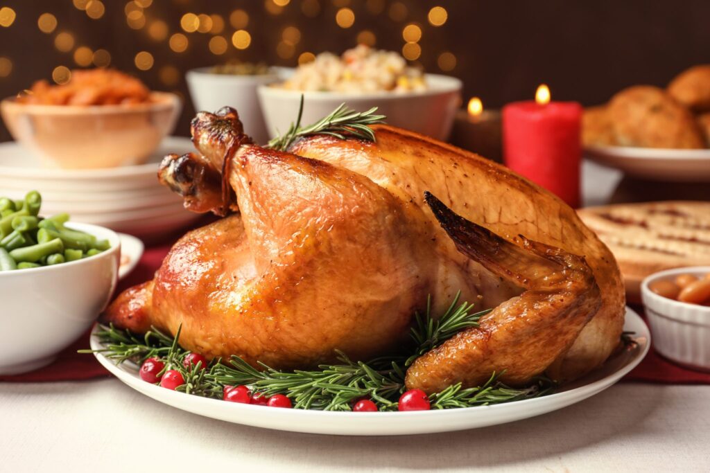 Traditional festive dinner with delicious roasted turkey served